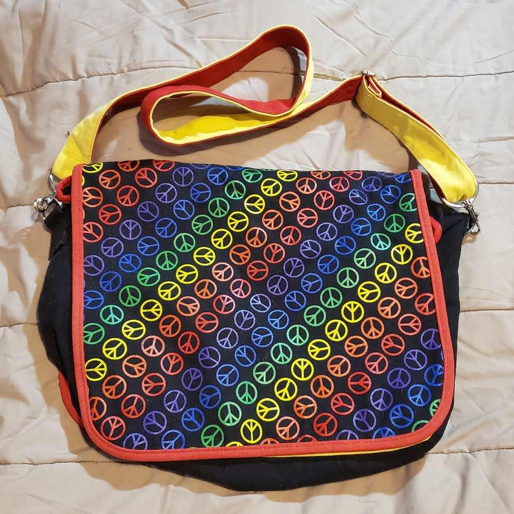 Spencer's rainbow peace symbol messenger bag
